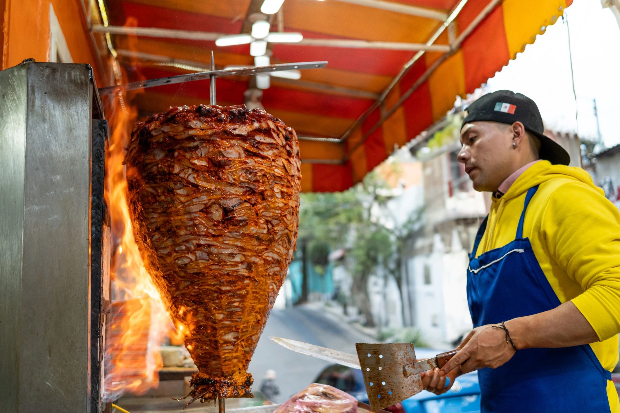 Mexican chef preparing tacos